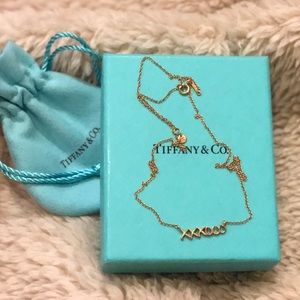 SOLD! Tiffany and co. 18k gold XXXOOO necklace